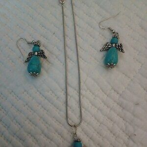 Metal necklace with turquoise angel and paired earrings